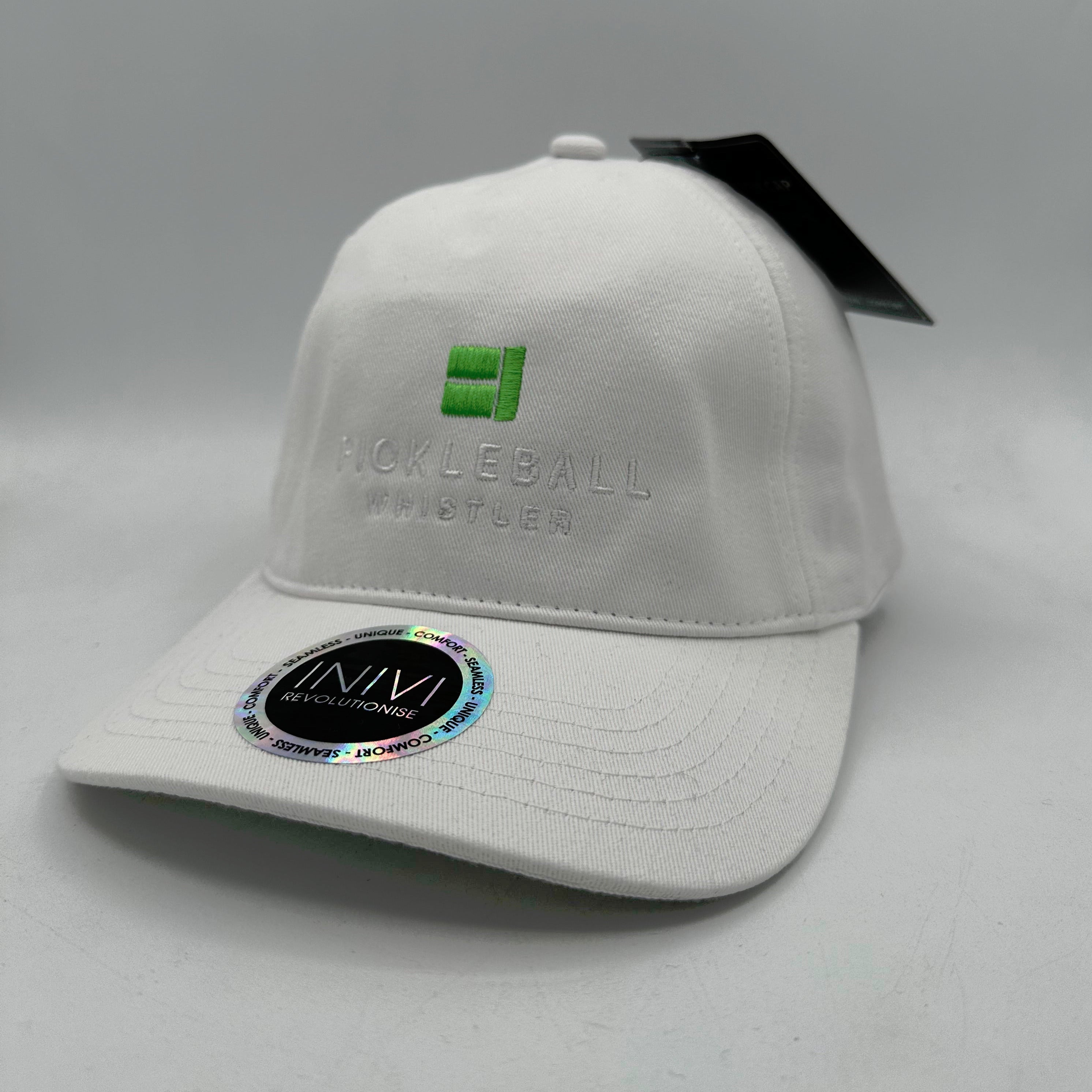 White baseball cap with Pickleball Whistler logo